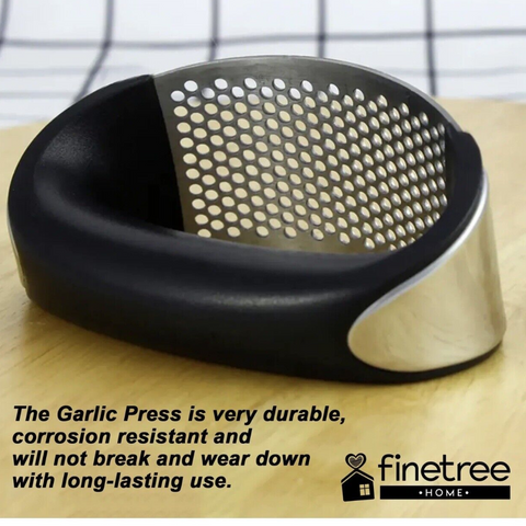 Introducing the Manual Stainless Steel Garlic Press: Simplify garlic mincing.