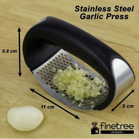 Introducing the Manual Stainless Steel Garlic Press: Simplify garlic mincing.